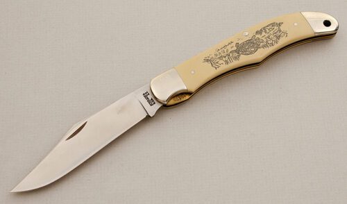 Schrade Cutlery Turtle Commemorative Scrimshaw with Ivory Micarta Scales handle material - Obverse Side - Item #KLC15576