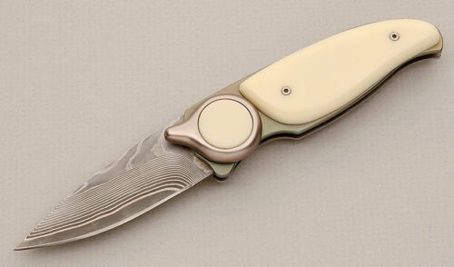 Hiro Knives Rotating Button Lock Folder with White Delrin Scales handle material - Obverse Side - Item #KLC15613