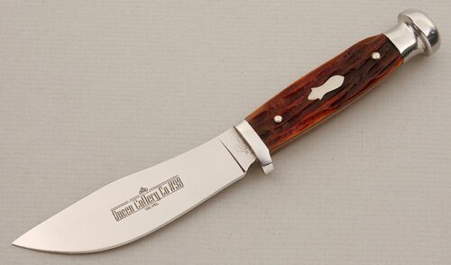 Queen Cutlery #98 Upswept Hunter with Brown Jigged Bone Scales handle material - Obverse Side - Item #KLC15692