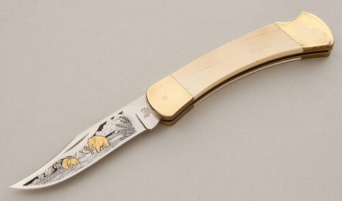 Buck Knives Custom 110 "The Mastodon" with Mastodon Ivory Scales handle material - Obverse Side - Item #KLC15720