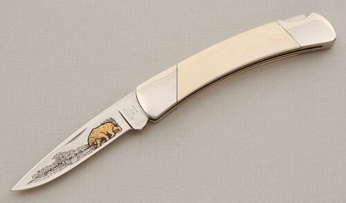 Buck Knives Classic III Saber Tooth Tiger with Saber Tooth Tiger Fang Scales handle material - Obverse Side - Item #KLC15724