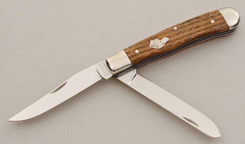 Ka-Bar Knives Dog's Head Trapper with American Chestnut Scales handle material - Obverse Side - Item #KLC15745