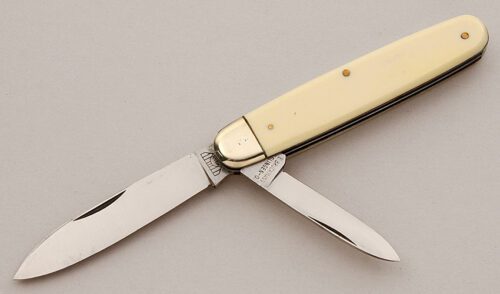Bruckmann Knives Sleeveboard Folder with Ivory Micarta Scales handle material - Obverse Side - Item #KLC15766