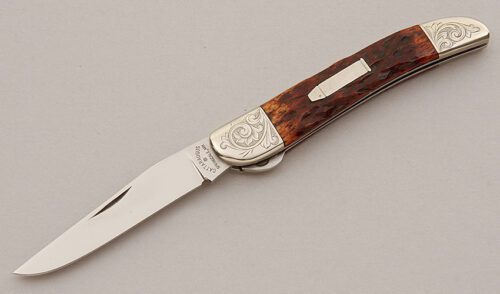 Cattaraugus Cutlery CM-12 Split Bolster Jack with Brown Jigged Bone Scales handle material - Obverse Side - Item #KLC15777