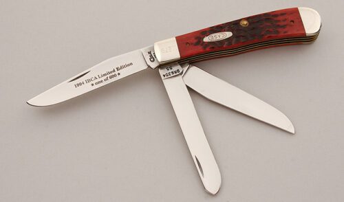 Case Cutlery 1994 IBCA Three Blade Trapper with Red Jigged Bone Scales handle material - Obverse Side - Item #KLC15783