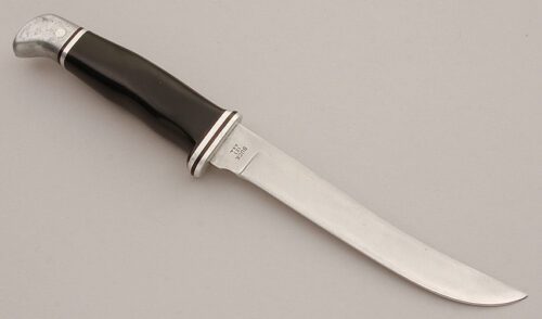 Buck Knives Model 121 Fisherman with Black Phenolic Handle handle material - Obverse Side - Item #KLC15885