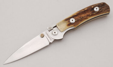 with handle material - Obverse Side - Item # KLC19645